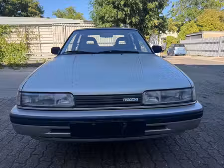 Mazda 626 2.0 115